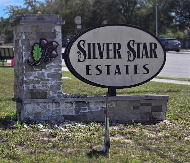 view of community sign