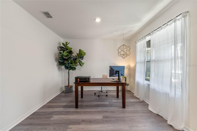 office area featuring recessed lighting, visible vents, baseboards, and wood finished floors