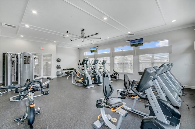 exercise room with baseboards, visible vents, and recessed lighting