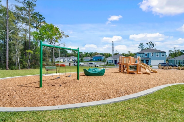 community play area featuring a lawn