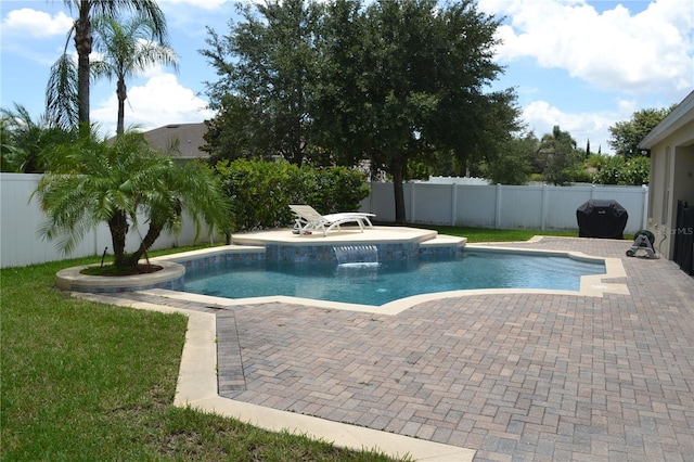 view of pool with a fenced in pool, a fenced backyard, and a patio