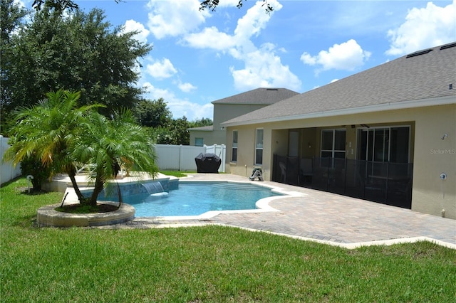 view of swimming pool featuring a fenced in pool, a patio area, a lawn, and a fenced backyard