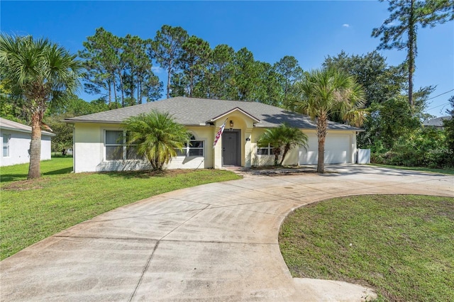 ranch-style home featuring a garage, driveway, a front lawn, and stucco siding