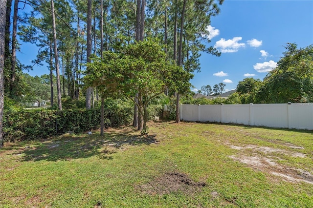 view of yard with fence