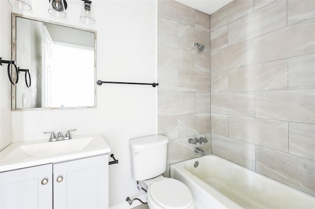 bathroom with toilet, shower / bath combination, and vanity