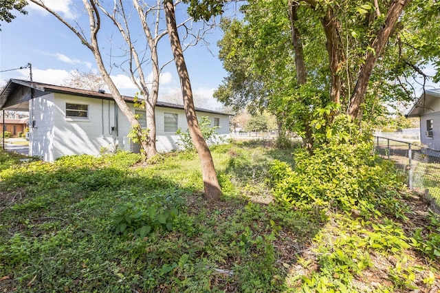 view of yard with fence