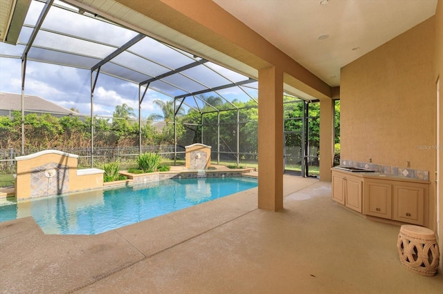 1704 Kersley Cir, Lake Mary, FL 32746 - outdoor pool with glass enclosure, a patio area, fence, and an outdoor kitchen