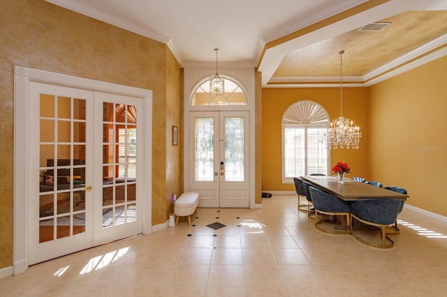1704 Kersley Cir, Lake Mary, FL 32746 - tiled foyer entrance featuring a chandelier, visible vents, baseboards, ornamental molding, and french doors