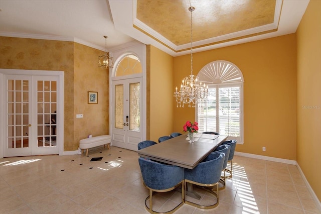 1704 Kersley Cir, Lake Mary, FL 32746 - tiled dining room with a chandelier, a tray ceiling, french doors, and baseboards