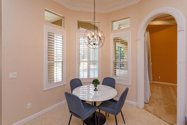 1704 Kersley Cir, Lake Mary, FL 32746 - dining room featuring light tile patterned floors, baseboards, ornamental molding, and a chandelier