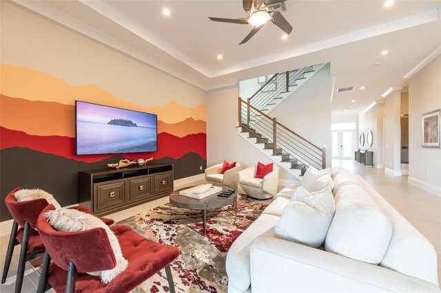 living area featuring recessed lighting, visible vents, stairway, a ceiling fan, and baseboards