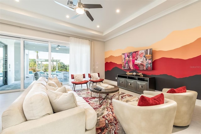 living room with ceiling fan, visible vents, and recessed lighting