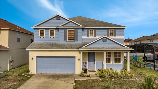 traditional home featuring covered porch, roof with shingles, concrete driveway, and an attached garage