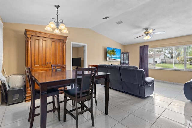 dining room featuring light tile patterned floors, visible vents, vaulted ceiling, and ceiling fan with notable chandelier