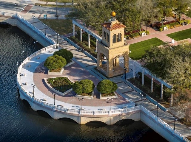 birds eye view of property with a water view