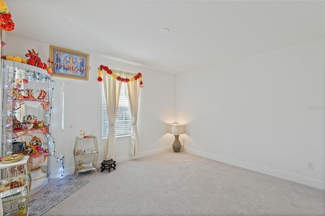 playroom with carpet and baseboards