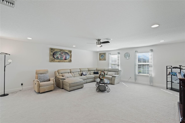 living area with baseboards, visible vents, a ceiling fan, carpet floors, and recessed lighting