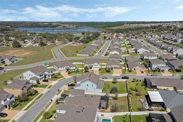 aerial view featuring a water view and a residential view