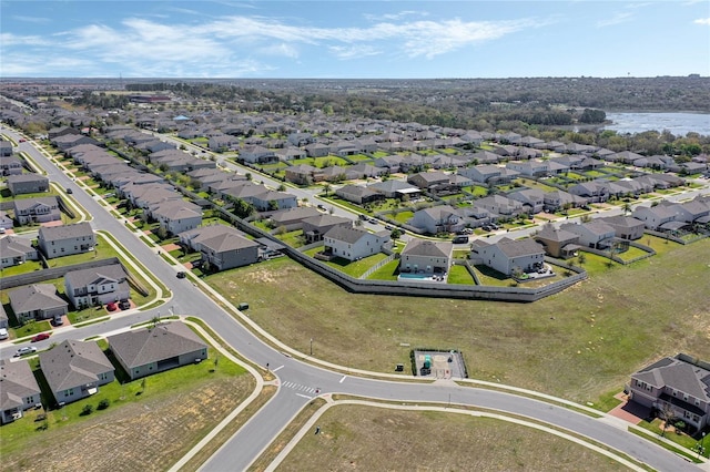 aerial view featuring a water view and a residential view