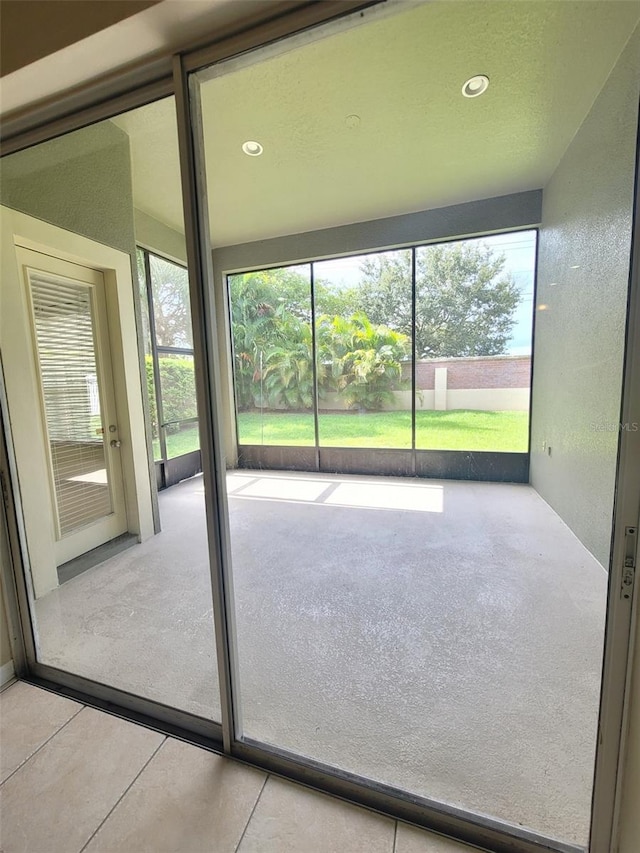 view of unfurnished sunroom