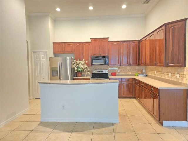 13413 Zori Ln, Windermere, FL 34786 - kitchen featuring stainless steel appliances, crown molding, tasteful backsplash, light tile patterned floors, and recessed lighting