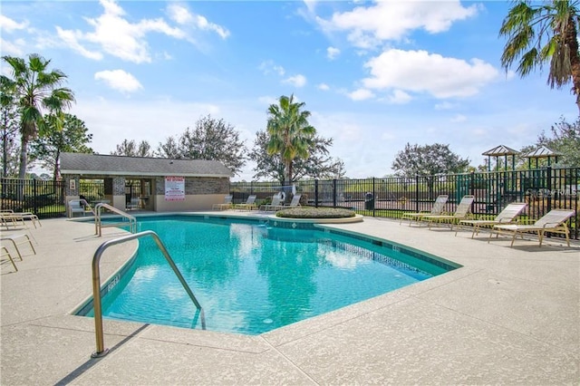 13413 Zori Ln, Windermere, FL 34786 - community pool with a patio area