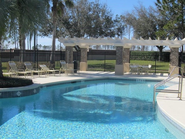 13413 Zori Ln, Windermere, FL 34786 - community pool featuring a patio area