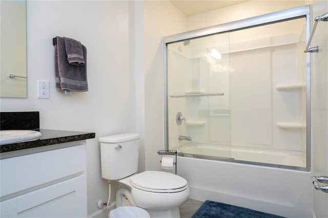 full bathroom with shower / bath combination with glass door, vanity, and toilet