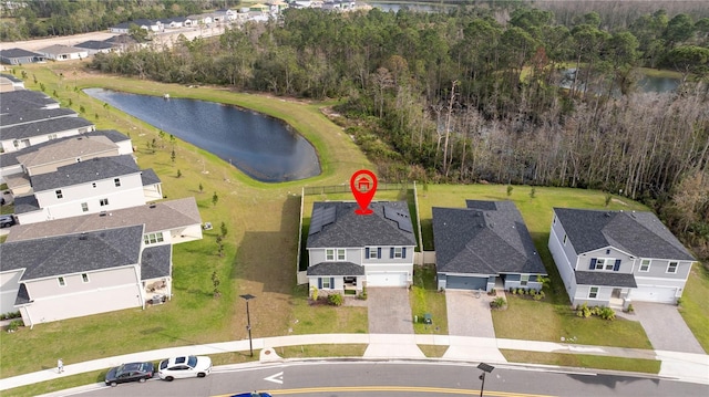 aerial view featuring a residential view and a water view