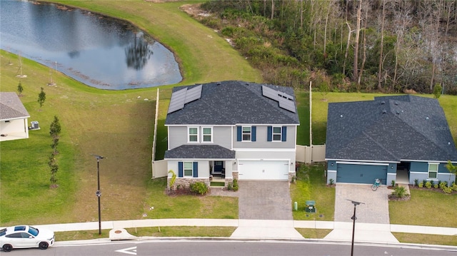 bird's eye view with a water view