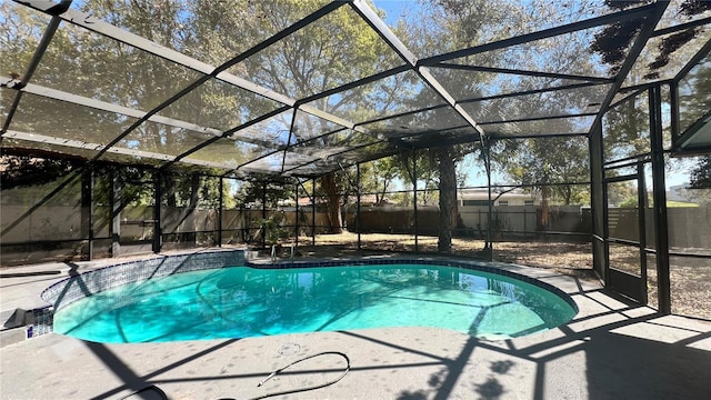 view of pool with a fenced in pool, a patio area, a lanai, and a fenced backyard