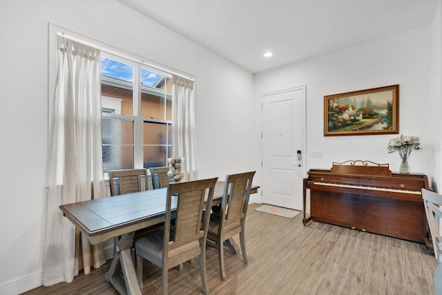 2312 Datura Loop, Saint Cloud, FL 34772 - dining area with recessed lighting, light wood-style flooring, and baseboards