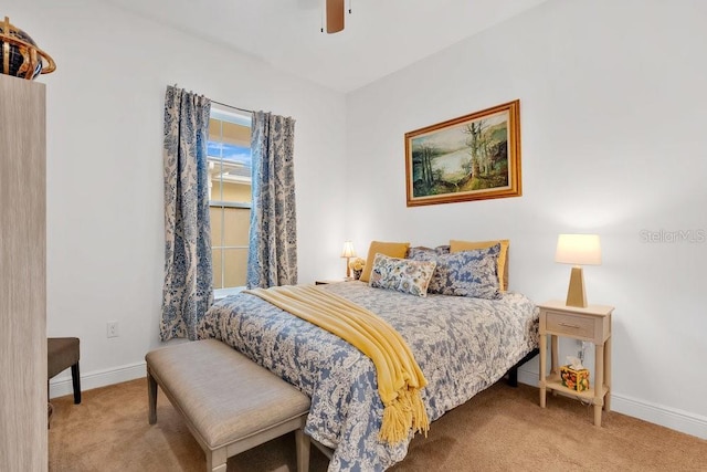 2312 Datura Loop, Saint Cloud, FL 34772 - bedroom featuring carpet floors, a ceiling fan, and baseboards