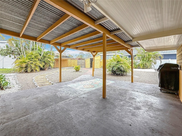 view of patio / terrace featuring a fenced backyard and a grill