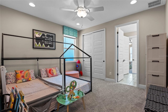 carpeted bedroom with recessed lighting, a closet, visible vents, ceiling fan, and baseboards