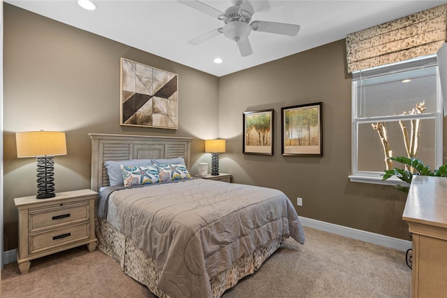 bedroom featuring light carpet, ceiling fan, recessed lighting, and baseboards