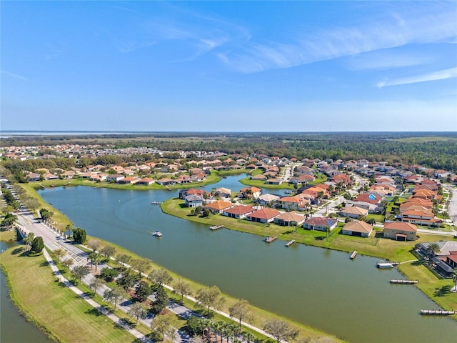 2541 Shoal Bass Way, Kissimmee, FL 34746 - aerial overview of property's location featuring nearby suburban area and a large body of water