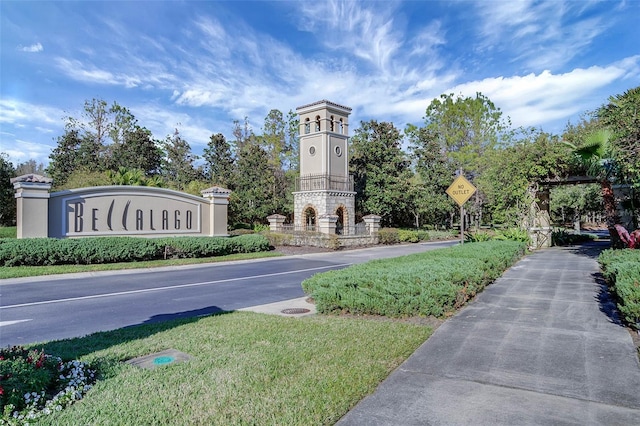 2541 Shoal Bass Way, Kissimmee, FL 34746 - view of asphalt street featuring traffic signs