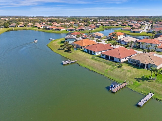 2541 Shoal Bass Way, Kissimmee, FL 34746 - aerial perspective of suburban area with a large body of water