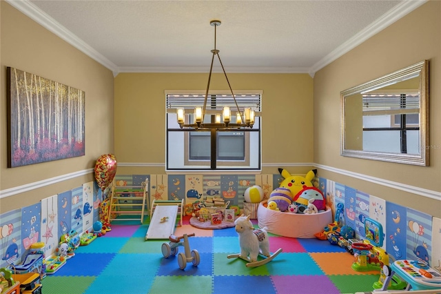 2541 Shoal Bass Way, Kissimmee, FL 34746 - recreation room featuring ornamental molding and a chandelier