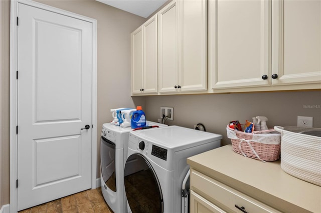 2541 Shoal Bass Way, Kissimmee, FL 34746 - clothes washing area featuring cabinet space and washer and clothes dryer