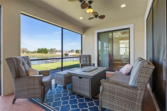 2541 Shoal Bass Way, Kissimmee, FL 34746 - sunroom / solarium with ceiling fan, an outdoor hangout area, and a water view