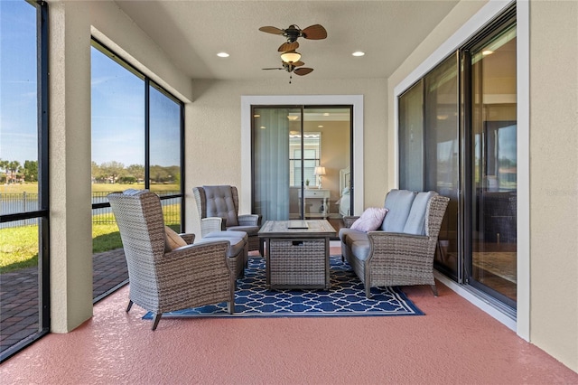 2541 Shoal Bass Way, Kissimmee, FL 34746 - sunroom / solarium featuring ceiling fan, carpet, and a healthy amount of sunlight