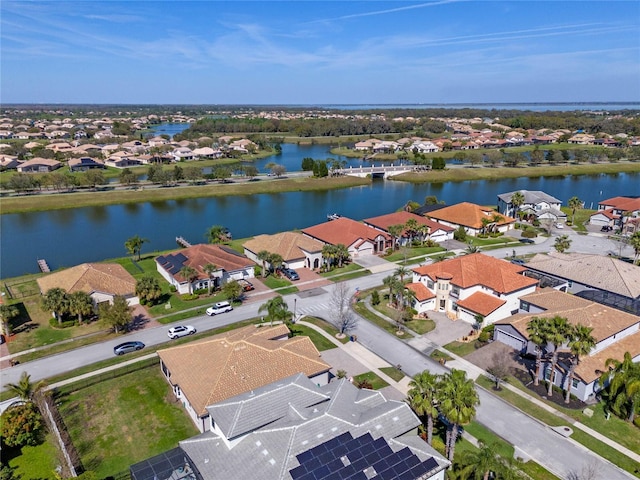 2541 Shoal Bass Way, Kissimmee, FL 34746 - aerial perspective of suburban area featuring a large body of water
