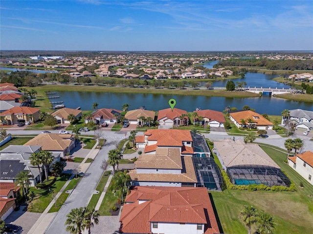 2541 Shoal Bass Way, Kissimmee, FL 34746 - aerial view of residential area featuring a large body of water