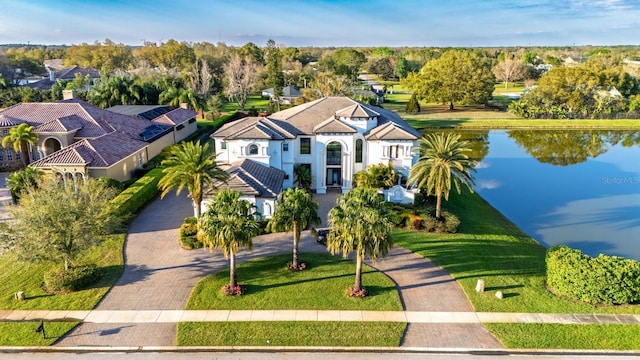 bird's eye view with a water view