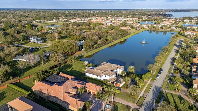 bird's eye view featuring a residential view and a water view