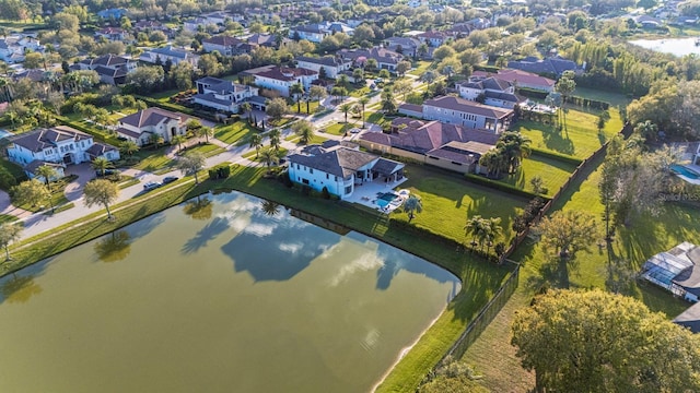 bird's eye view featuring a residential view and a water view