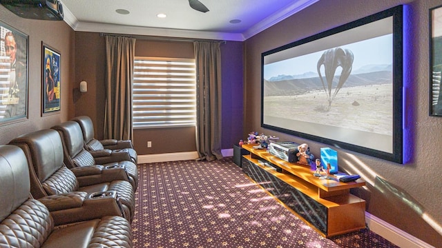 cinema room featuring baseboards, carpet, and crown molding