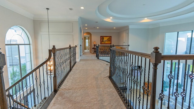 hallway with recessed lighting, carpet flooring, visible vents, an upstairs landing, and ornamental molding